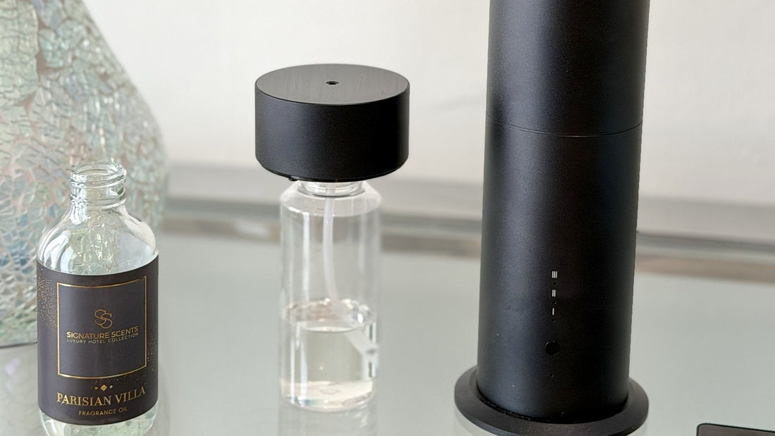 Parisian Villa fragrance oil beside the Tower Diffuser oil reservoir and body, showing there is no water tank
